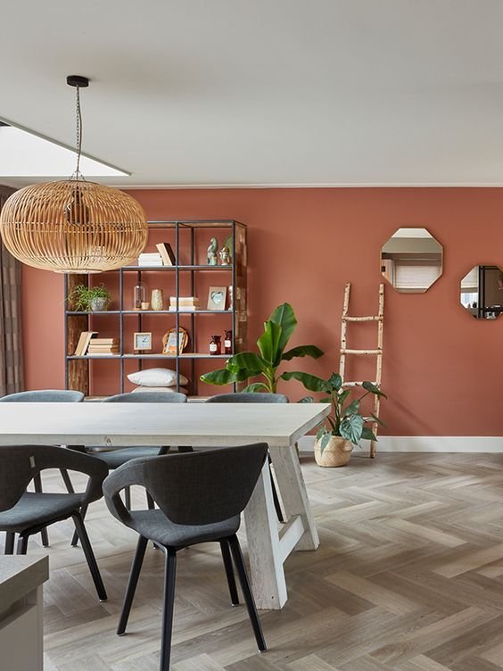 Dining room with terracotta walls
